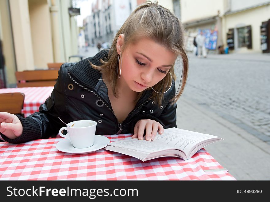 The female student in cafe street in old city. The female student in cafe street in old city