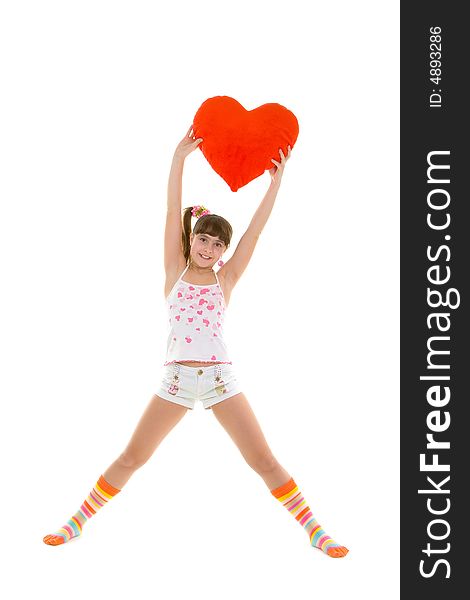 Happy girl is jumping with heart over white background