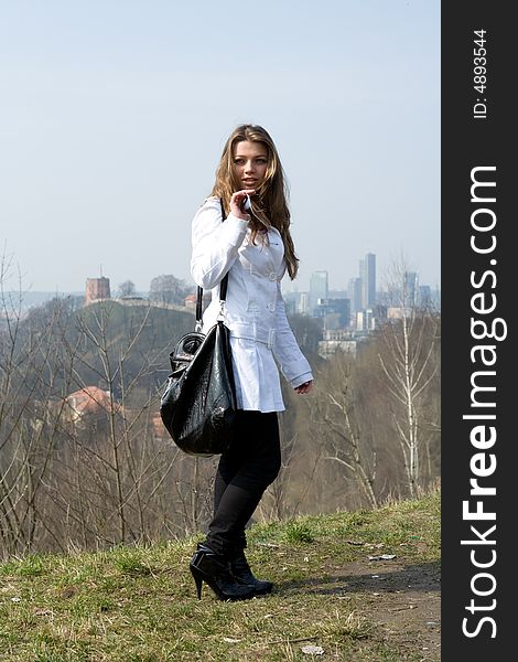 Girl In A White Raincoat