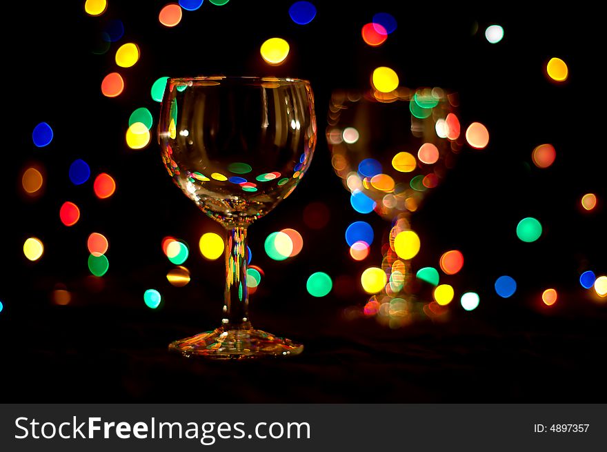 Wine glasses with colored flares. Wine glasses with colored flares