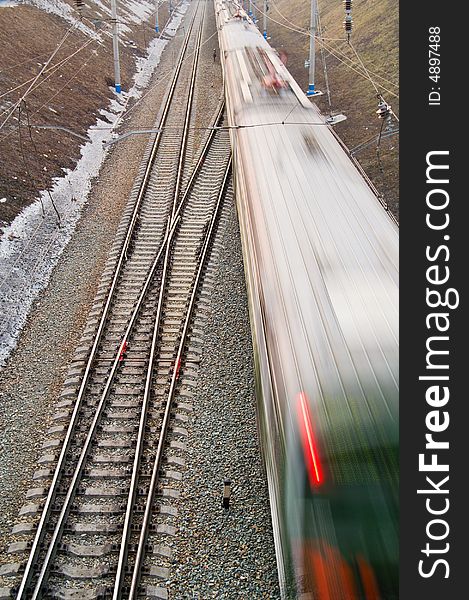 Electric train is running away, motion blur. Electric train is running away, motion blur