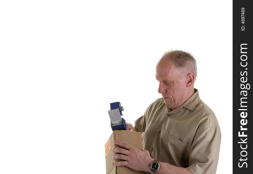 An old guy with a tape gun, trying to tape up a box. An old guy with a tape gun, trying to tape up a box