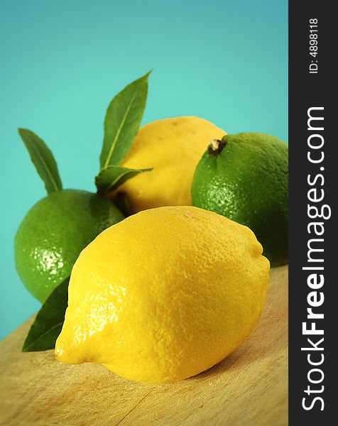 Photo of fresh lemons and limes. Photo of fresh lemons and limes.