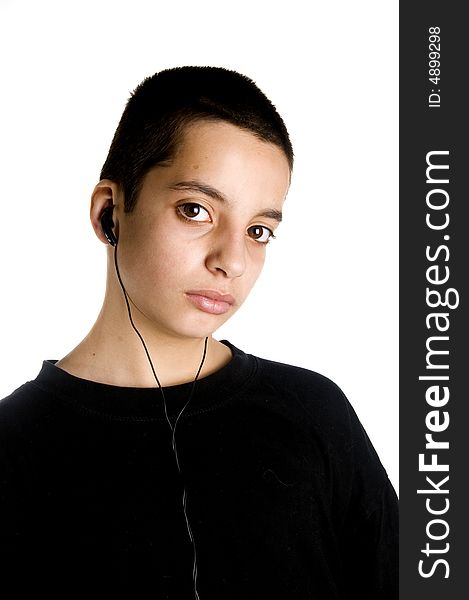 Teenage boy listening to a MP3 player