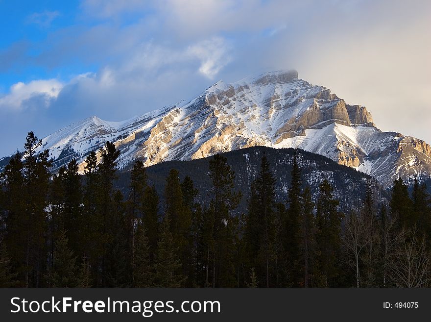 A snow covered peak early in the morning in Banff National Park, Canada.
