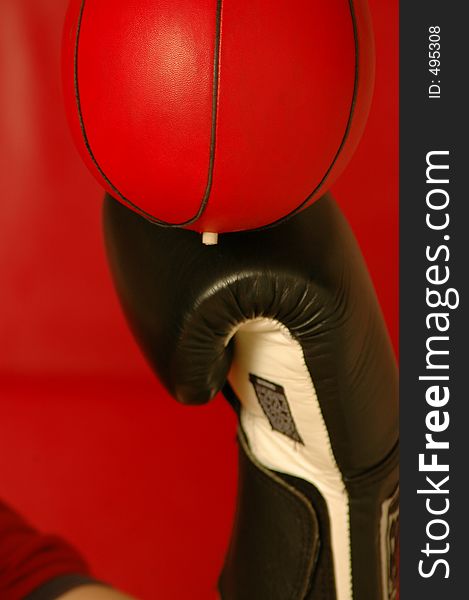 Lots of red black boxer gloves red speed bag still life. Lots of red black boxer gloves red speed bag still life