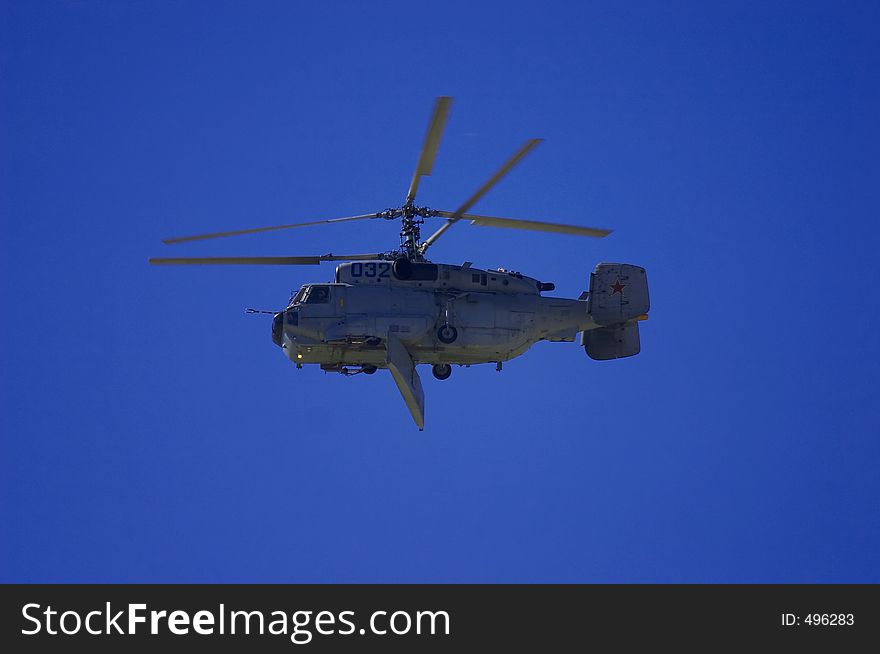 Military helicopter flying in the sky on MAKS 2005