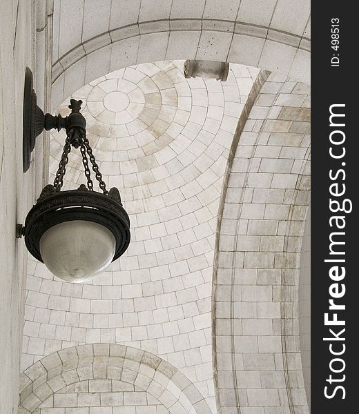 Vintage lamp and white stone arches. Vintage lamp and white stone arches