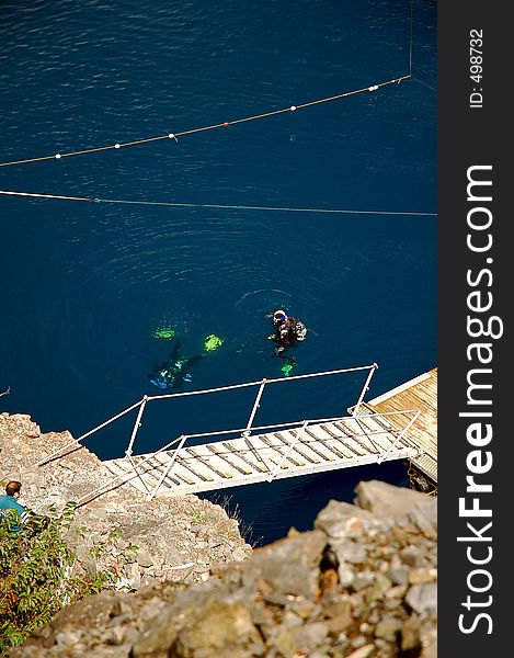 Quarry lake in Germany, which is often visited by scuba divers. Deep blue coloured water because of mineral content, extremely good visibility. Depth > 50 m. Quarry lake in Germany, which is often visited by scuba divers. Deep blue coloured water because of mineral content, extremely good visibility. Depth > 50 m.