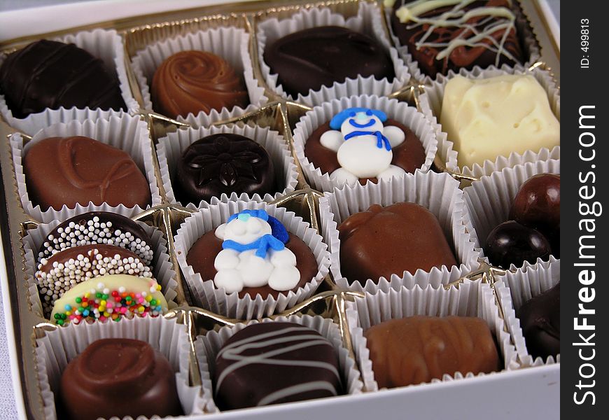 Box of chocolate assortment close up. Box of chocolate assortment close up.