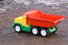 Baby Toy Dump Truck In Mud Stock Photos Baby Toy Dump Truck In Mud Stock Photos