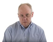 Old Guy In Blue Shirt Looking Over Glasses Royalty Free Stock Photos Old Guy In Blue Shirt Looking Over Glasses Royalty Free Stock Photos