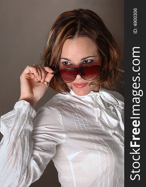 Portrait of hispanic fashion woman wearing sunglasses. Portrait of hispanic fashion woman wearing sunglasses