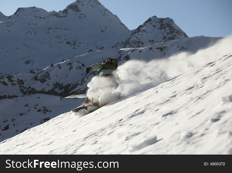 Snowboard freeride in high mountains, snow, winter