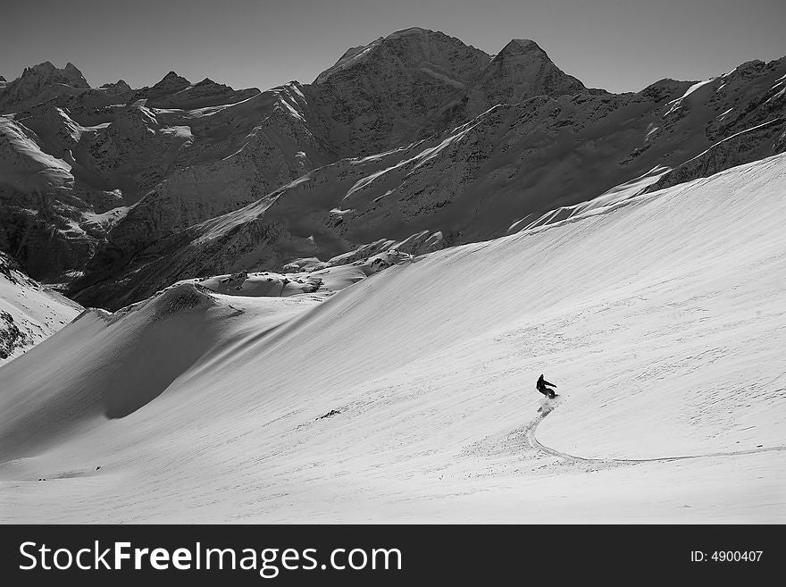 Snowboard freeride in high mountains