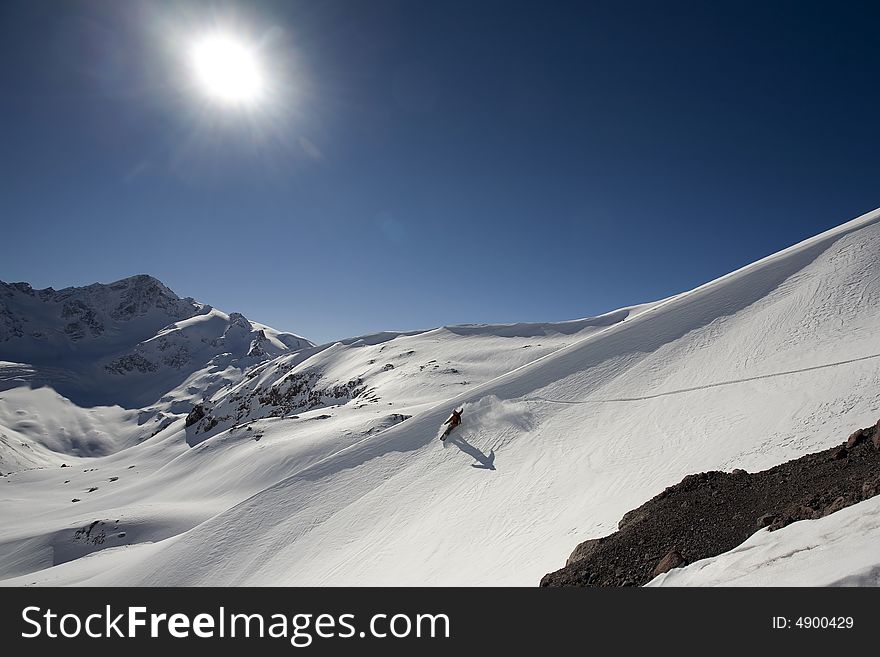 Snowboard freeride in high mountains, snow, winter