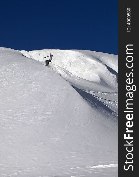 Snowboard freeride in high mountains, snow, winter