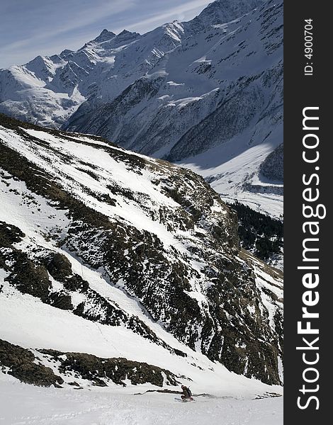 Ski freeride in high mountains, sky, winter