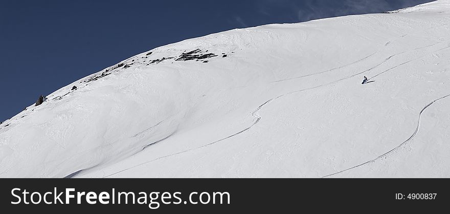 Snowboard freeride in high mountains, snow, winter