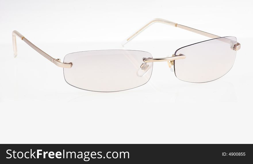 Beige sunglasses isolated on white background