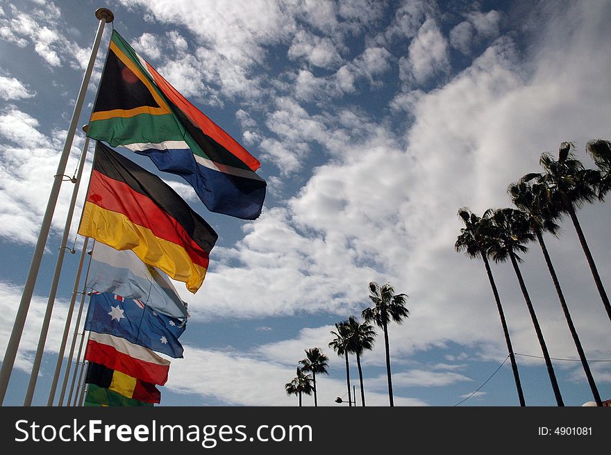 Photo of colorfull flags in a sunny windy day. Photo of colorfull flags in a sunny windy day