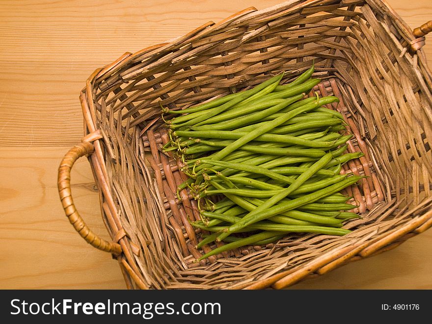 Wicker basket of green bobby beans