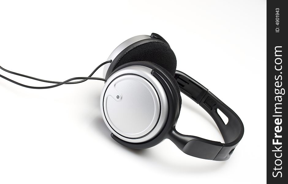 Modern headphones isolated on white