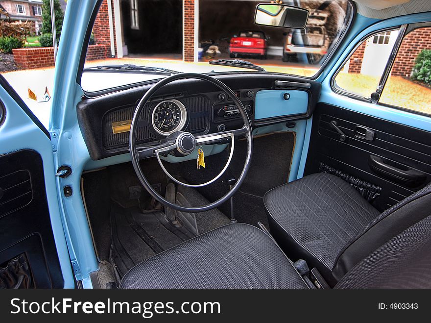 The interior of an old antique car. The interior of an old antique car.