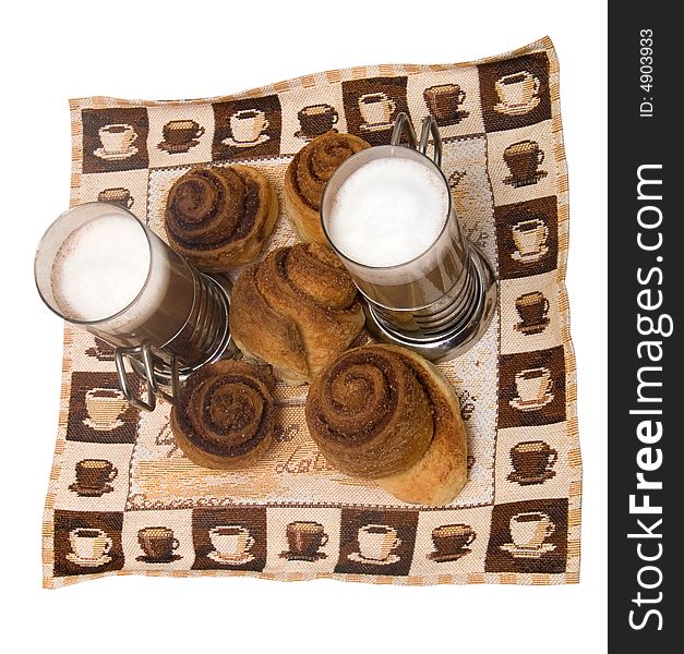 Home-made cinnamon snail bakery with latte on table-napkin