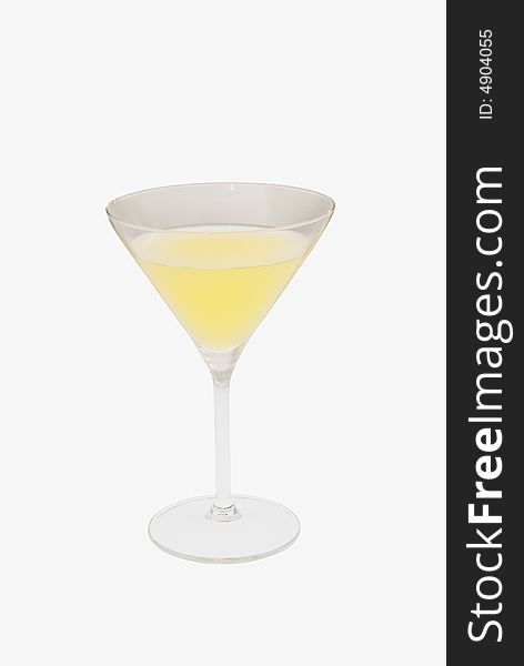 Yellow juice in the glass  isolated