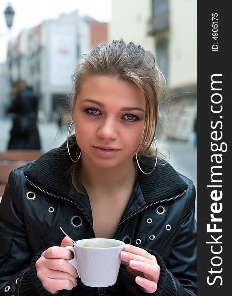 student in cafe street in old city