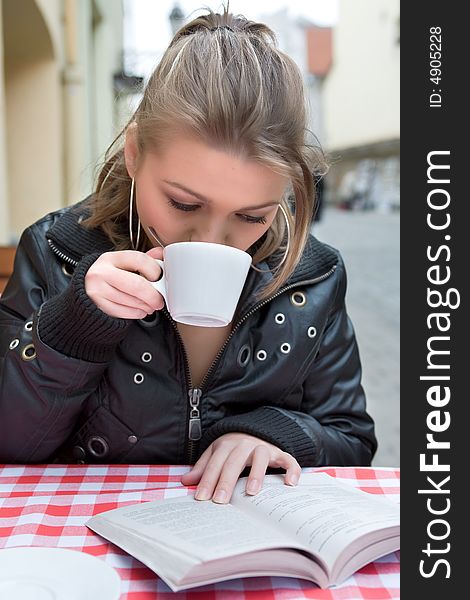 Student in cafe street in old city