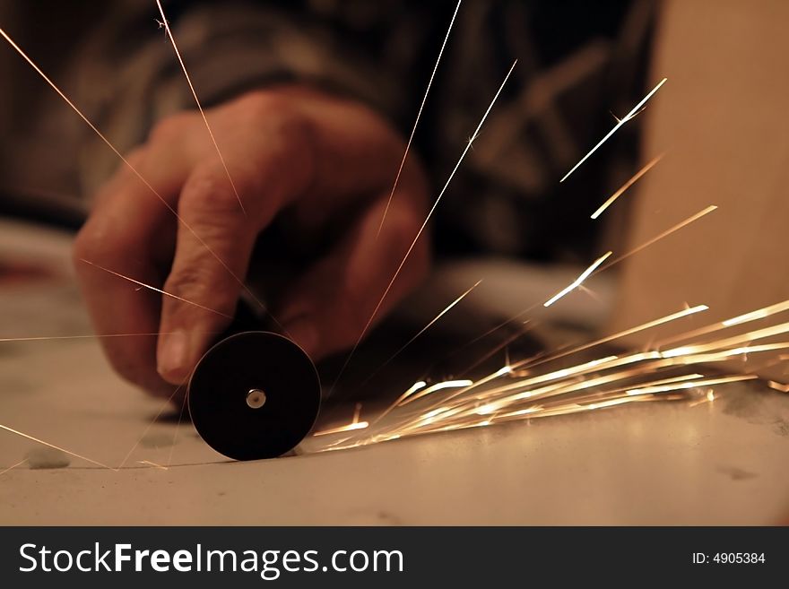 Sparks from the working machine