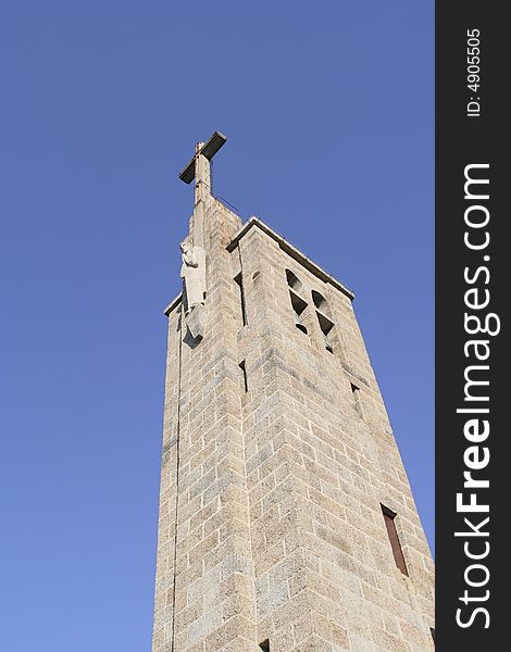 Church tower in a blue sky