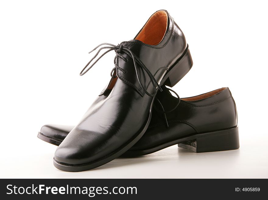 Pair of classic style black leather shoes. Pair of classic style black leather shoes