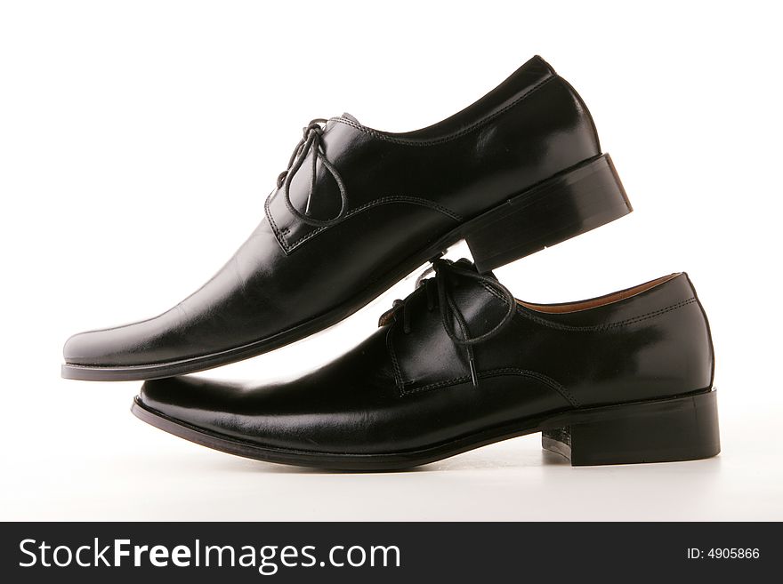 Pair of classic style black leather shoes. Pair of classic style black leather shoes