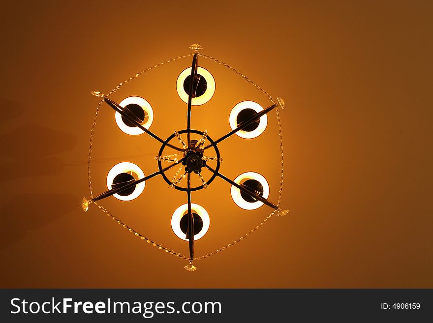 A dome lamp  at  a lobby room in a hotel. A dome lamp  at  a lobby room in a hotel