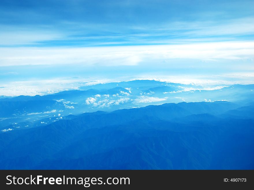 Arial view of mountains through the flight. Arial view of mountains through the flight