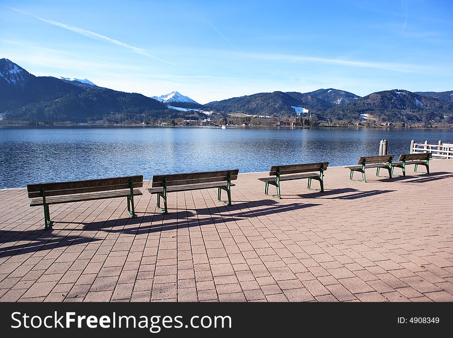 Empty benches at lake Tegernsee