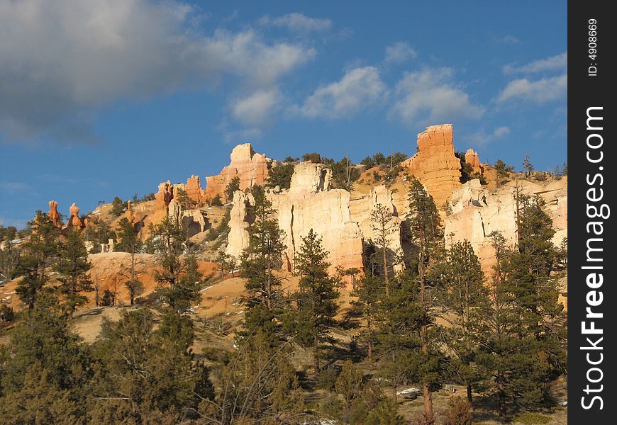 The colorful variety if rock, tree, and sky. The colorful variety if rock, tree, and sky