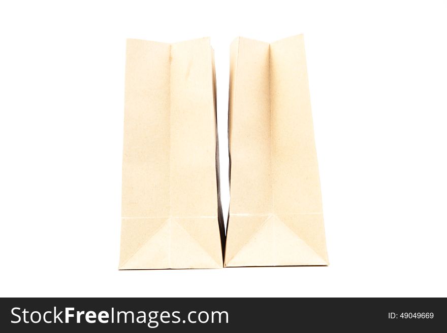 Two brown paper bag. For food. On a white background