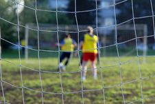 Soccer Players In Front Of Net Stock Image