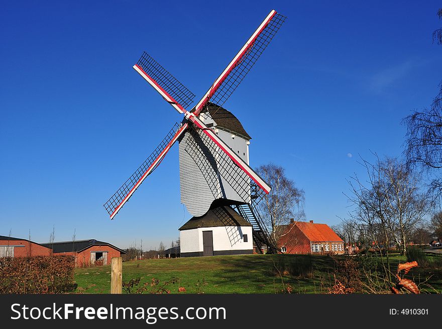 Windmill with blue sky background