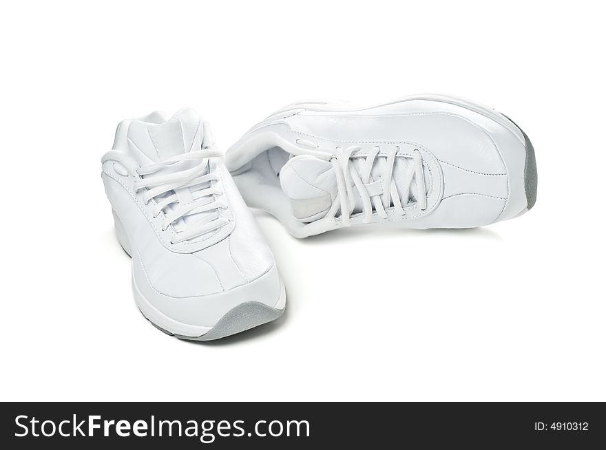 White sport shoes isolated on a white