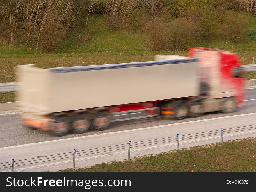 A truck travelling at high speed. A truck travelling at high speed