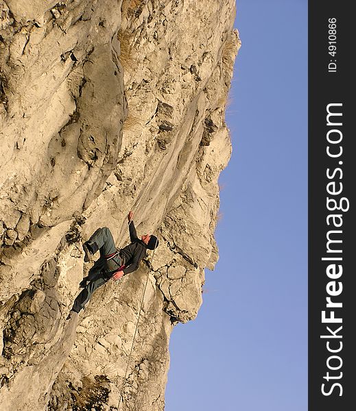 A male rock-climber on training