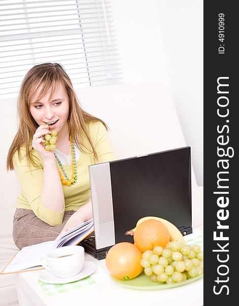 Portrait of beautiful woman with laptop / at home