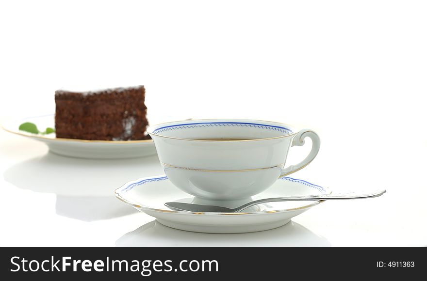 Cup of coffee and chocolate cake