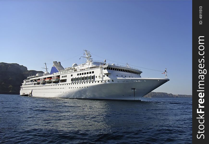White cruiseship navigating in greek waters. White cruiseship navigating in greek waters