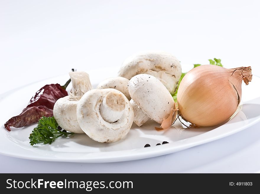 Food series: some mushrooms on the white plate